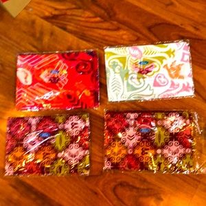 4 scarfs. New never used still in wrappers. The Susan B Komen Race For The Cure